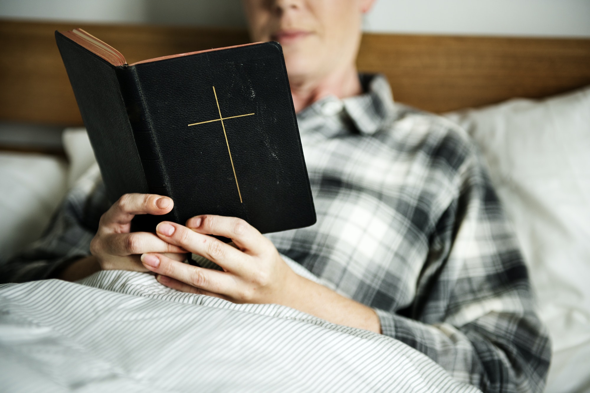 A woman reading a bible